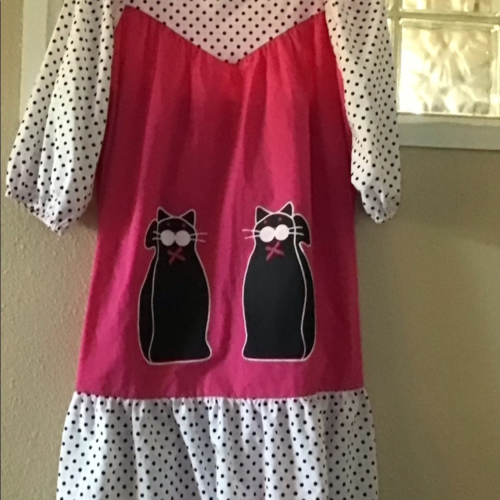 Sale! You be “purrrty” cute in this cotton blend with polka dot trim.